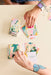 Flatter Me: A Compliment Battle Card Game Board Games Pink Tiger Games